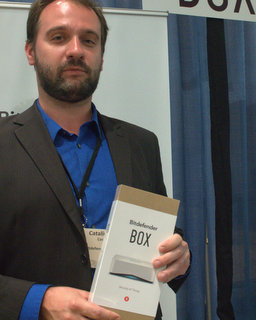 Bitdefender's Catalin Cosoi with Bitdefender Box (BootCamp photo by L. Fishkin)