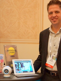 D-Link's Dan Kelley with new Wi-Fi Baby Camera (BootCamp photo by L. Fishkin)