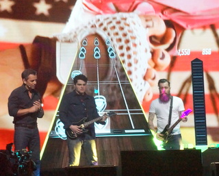 On stage at Guitar Hero announcement (BootCamp photo by L. Fishkin)