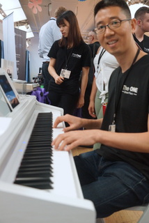 The One Music Group CEO Ben Ye with Smart Piano (BootCamp photo by L. Fishkin)