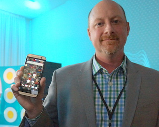 Sprint VP of Product Engineering and Development Ryan Sullivan with HTC One M8 Harman Kardon edition (BootCamp photo by L. Fishkin)
